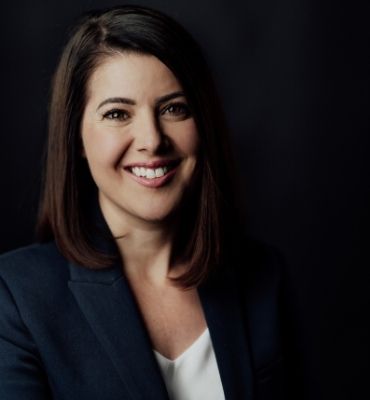 Image of CEO, Antonia Albanese, smiling at the camera
