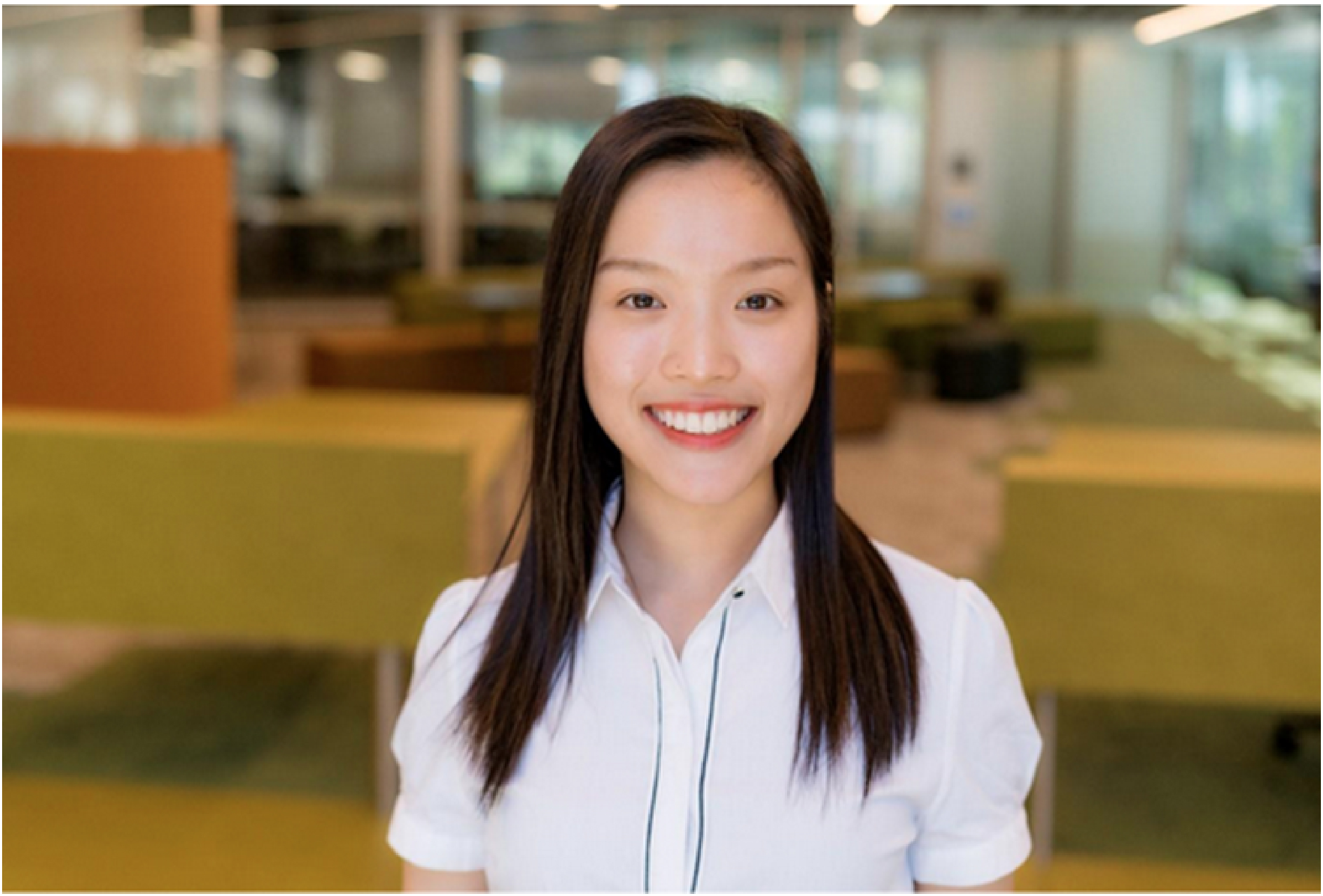 Image of Occupational Therapist, Christy Lam, smiling at the camera