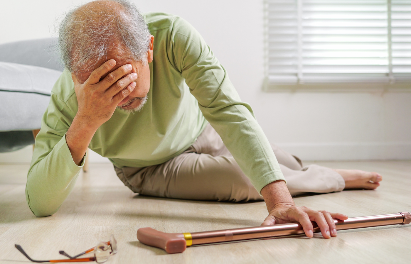 elderly man on floor after having fallen